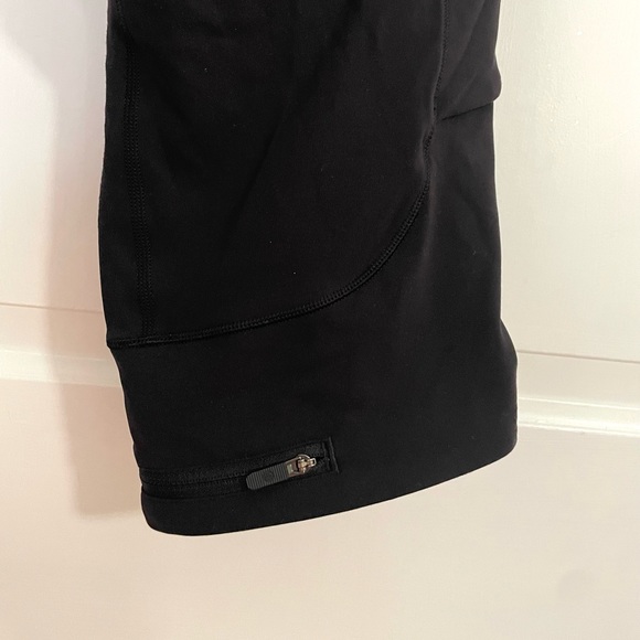 Lululemon Black Leggings 28” Length Size 4 With Pockets and Reflective Parts - Picture 8 of 9
